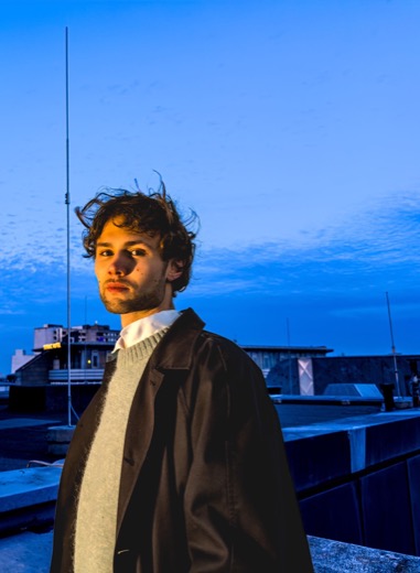 Julius Lutz on a Berlin rooftop at dusk